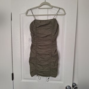 Honey Peach olive green ruched bodycon mini dress featuring spaghetti straps